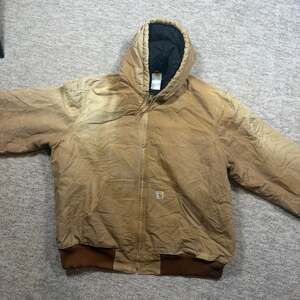 Vintage Carhartt J140 BRN Quilted Flannel Lined Duck Active Jacket Made in USA